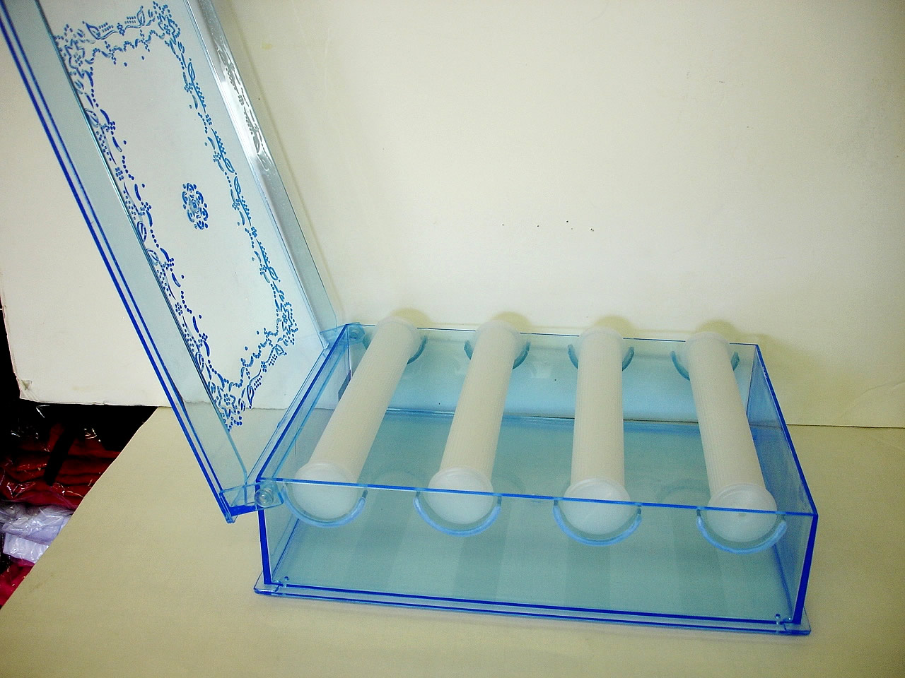 Indian bangle stand and bangle storage plastic box.